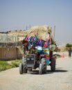 An overloaded tractor in Kandahar Afghanistan