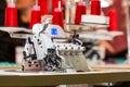 Overlock machine on sewing factory, nobody Royalty Free Stock Photo