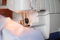 Overlock sewing machine workplace background Royalty Free Stock Photo