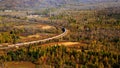 Overlook of a Train Travelling in the Immense Forest