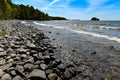 overlooking curved rocky beach at lake Vattern Sweden Royalty Free Stock Photo