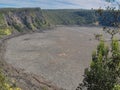 Overlooking volcanic pit crater at Kilauea Iki Trail at Volcanoes National Park on Big Island Hawaii Royalty Free Stock Photo