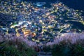 Overlooking the lively and colorful valley villages at night. Jiufen, Taiwan.