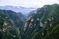 Overlooking the majestic mountains and steep valleys. Royalty Free Stock Photo