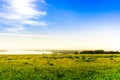 Overlooking the meadow lake and sky Royalty Free Stock Photo