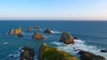 Overlooking multiple rocky islets called The Nuggets, seascape in New Zealand