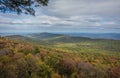 Overlooking the Shawangunk Mountain Range surrounded by bright fall foliage on a partly cloudy afternoon at Minnewaska State Park, Royalty Free Stock Photo