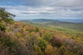 Overlooking the Shawangunk Mountain Range surrounded by bright fall foliage on a partly cloudy afternoon at Minnewaska State Park, Royalty Free Stock Photo