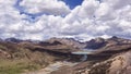 Overlooking sister Lake under white clouds, Batang, Sichuan, China. Royalty Free Stock Photo