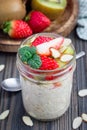 Overnight oatmeal with fresh strawberry and kiwi Royalty Free Stock Photo