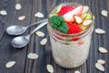 Overnight oatmeal with fresh strawberry and kiwi in glass jar Royalty Free Stock Photo