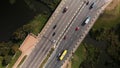 An overpass across the city river. Busy freeway. Aerial photography
