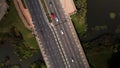 An overpass across the city river. Busy freeway. Aerial photography