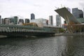 Modern bridge with coastal cityscape of skyscrapers on Yarra River, South Wharf, Melbourne, Victoria, Australia Royalty Free Stock Photo