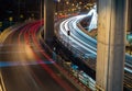 Overpass of the light trails with Bangkok city background at night Royalty Free Stock Photo