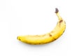 Overripe spoiled banana on a white isolated background