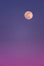 An oversaturated sky with a full super moon. Royalty Free Stock Photo