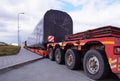 Oversize load or exceptional convoy. A truck with a special semi-trailer for transporting oversized loads. Very long vehicle