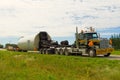 An oversize load on a small country highway