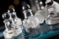 Overthrown King On Blue Chessboard With Crooked Angle And Bokeh Royalty Free Stock Photo