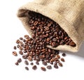 Overturned bag with roasted coffee beans Royalty Free Stock Photo