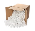 Overturned cardboard box with styrofoam cubes on white background Royalty Free Stock Photo