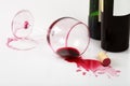 Overturned glass and wine stains Royalty Free Stock Photo