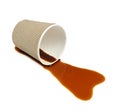 Overturned paper cup and spilled coffee on white background