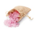 Overturned sack with pink sea salt isolated on white Royalty Free Stock Photo