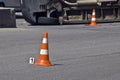 Overturned transport on accident site with traffic cones