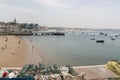 Overview of the beach, docks, boats and buildings of the town of Cascais, Portugal