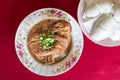 Overview of braised pork leg with mantou, popular Yunnan food served in Ban Rak Thai, Mae Hong Son province in Thailand