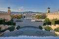 Overview of the city of Barcelona with the four towers and the fountain of Montjuich in the foreground to Tibidabo Mountain