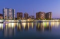 Overview of City and Reflection of Lights on Malaga Port Water Royalty Free Stock Photo