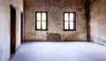 Overview of the empty room with old windows and doors. Royalty Free Stock Photo