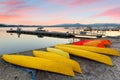 Overview of Jackson Lake with colorful boats in foreground before sun rise viewing from signal Mountain campground at Grand Teton Royalty Free Stock Photo