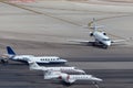 Overview of the private jet ramp at McCarran International Airport Las Vegas with multiple luxury jets parked on the tarmac