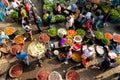 Overview of the street scene at a local vegetable market in Dhaka, Bangladesh showing colorfull fruits and spices