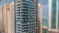 Overview to JBR and Dubai Marina skyline with modern high rise skyscrapers waterfront living apartments aerial timelapse Royalty Free Stock Photo