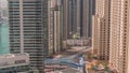 Overview to JBR and Dubai Marina skyline with modern high rise skyscrapers waterfront living apartments aerial timelapse Royalty Free Stock Photo