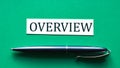 OVERVIEW - word on a green background with a black handle Royalty Free Stock Photo