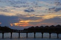 Overwater Bungalow shadow silhouette in a Resort during Sunset at a tropical resort island, Maldives Royalty Free Stock Photo