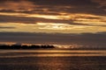 Overwater bungalow sunset in moorea french polynesia