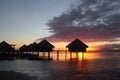 Overwater bungalow sunset Tahiti Royalty Free Stock Photo