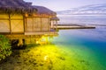 Overwater Bungalows at dusk, French Polynesia Royalty Free Stock Photo