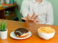 Overweight boy rejecting unhealthy food. Child refuses to eat Royalty Free Stock Photo