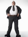 Overweight Businessman With Hands On Hips