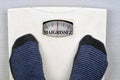 Weight scale indicating slimming in French