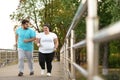 Overweight couple running together