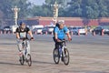 Overweight cyclists commuting in the early morning, Beijing, china